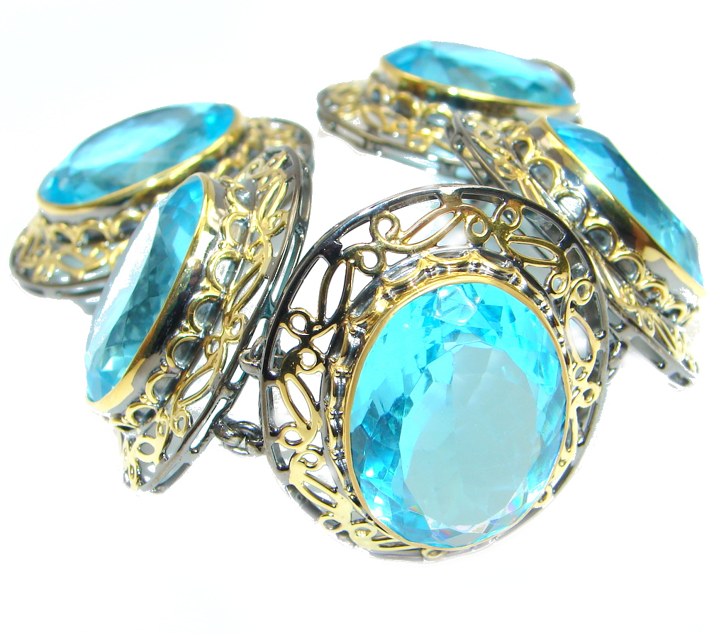 Giant Blue Ocean simulated Blue Topaz Gold Rhodium plated over Sterling Silver handcrafted Bracelet