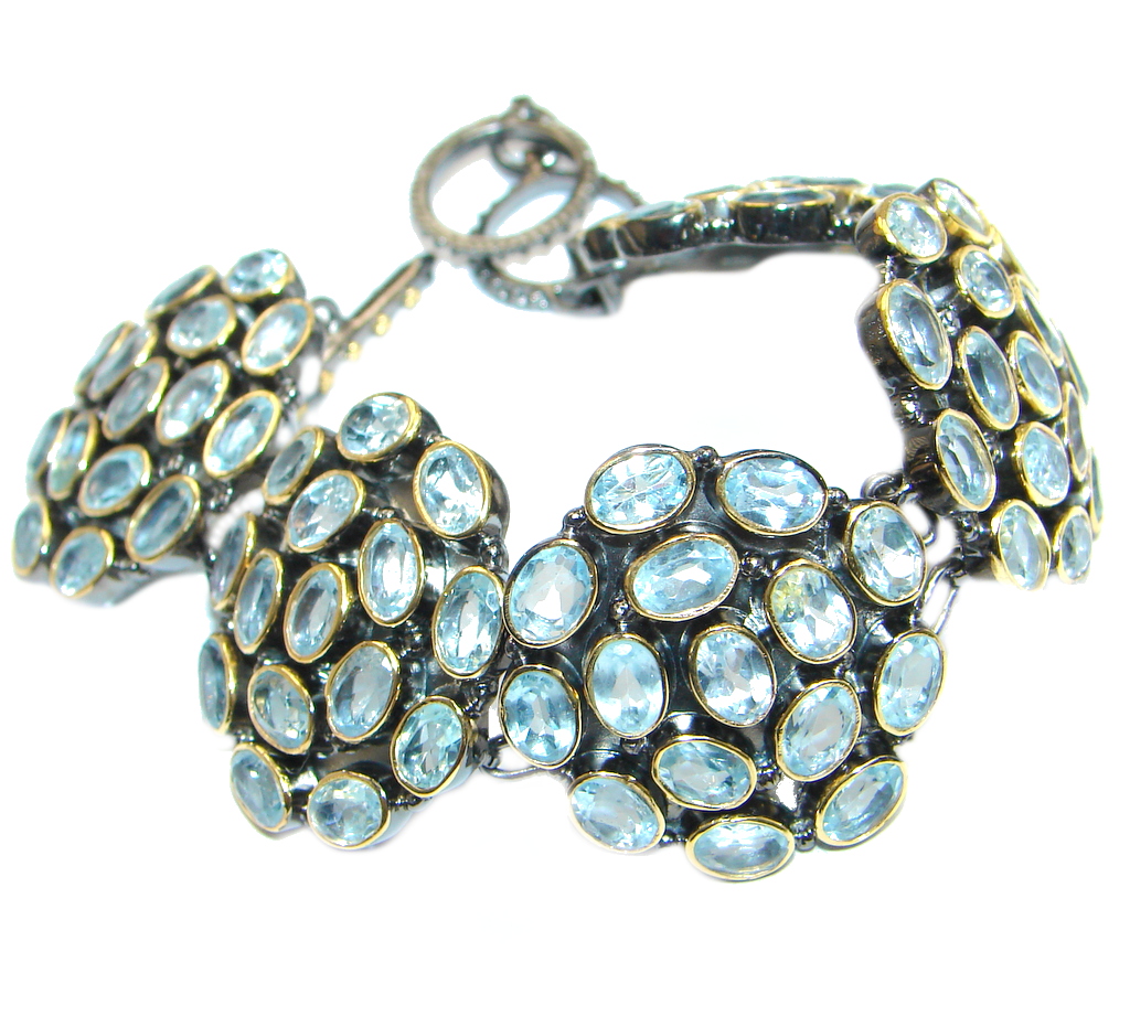 Andromeda Genuine Swiss Blue Topaz R Gold Rhodium plated over Sterling Silver Bracelet