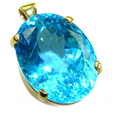 Atlantica pear cut 22.9 carat Swiss Blue Topaz 18K Gold over .925 Sterling Silver Handcrafted Pendant