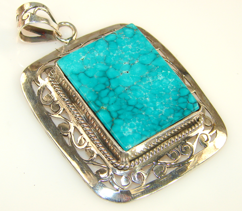 Artisan Design Of Blue Turquoise Sterling Silver pendant