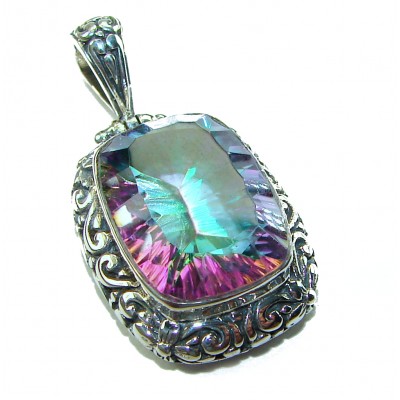 Blue Wonderland 20.7 carat oval cut Mystic Topaz .925 Sterling Silver handcrafted Pendant