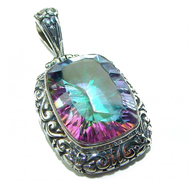 Blue Wonderland 20.7 carat oval cut Mystic Topaz .925 Sterling Silver handcrafted Pendant