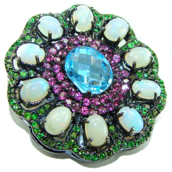 Costa del Sol oval cut 27.8 carat Ethiopian Opal Swiss Blue Topaz .925 Sterling Silver Handcrafted Pendant