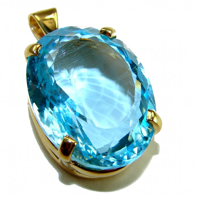 Atlantica oval cut 29.8 carat Swiss Blue Topaz 18K Gold over .925 Sterling Silver Handcrafted Pendant