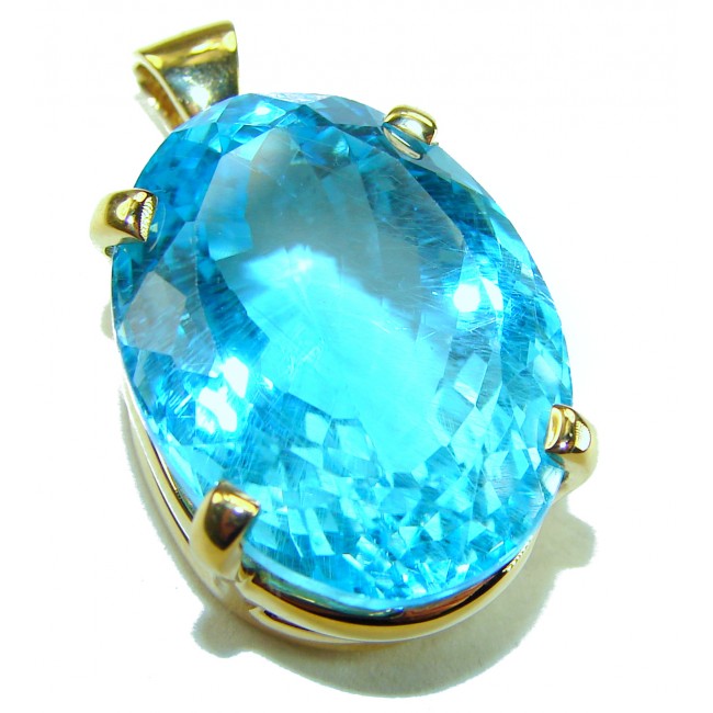 Atlantica oval cut 25.9 carat Swiss Blue Topaz 18K Gold over .925 Sterling Silver Handcrafted Pendant