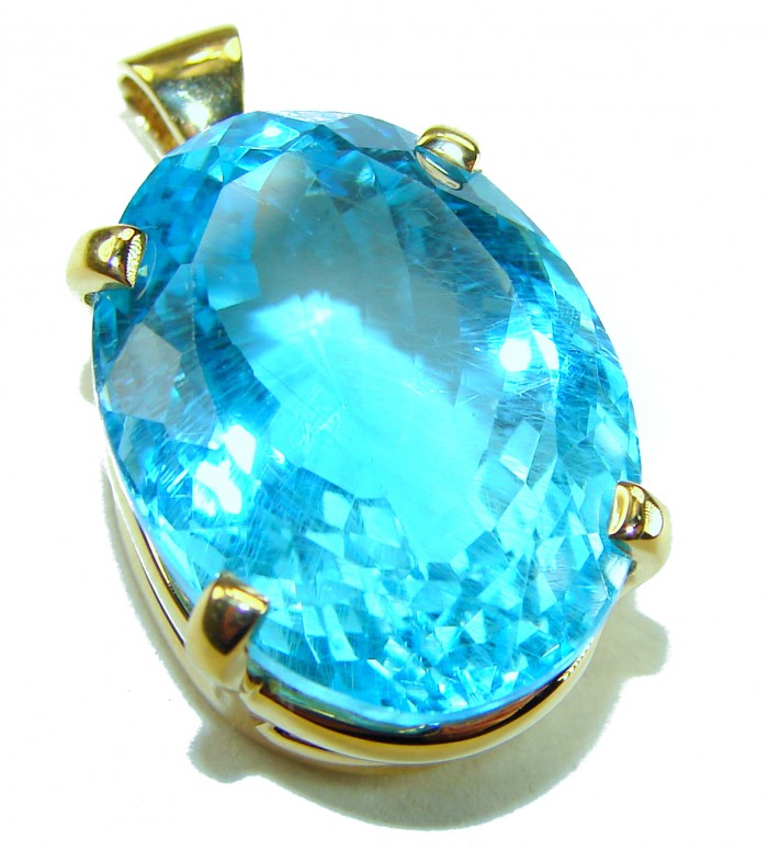 Atlantica oval cut 25.9 carat Swiss Blue Topaz 18K Gold over .925 Sterling Silver Handcrafted Pendant