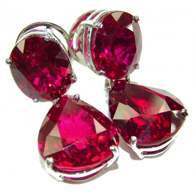 Authentic 36.9 carat Mozambique Ruby .925 Sterling Silver brilliantly handcrafted earrings