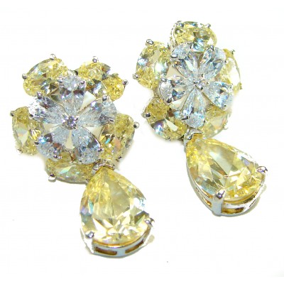 Luxurious 10.5 carat Golden - yellow Montana Sapphire .925 Sterling Silver handcrafted earrings