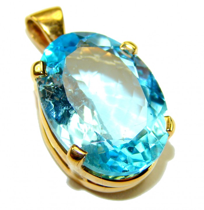 Atlantica oval cut 22.9 carat Swiss Blue Topaz 18K Gold over .925 Sterling Silver Handcrafted Pendant