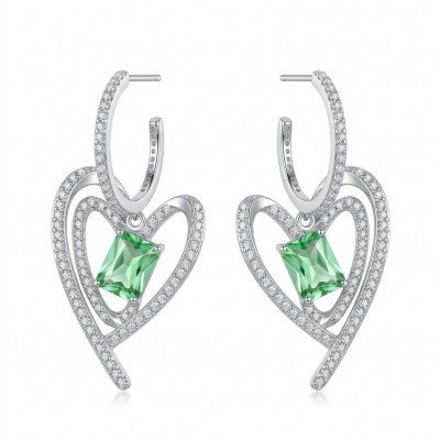 Luxurious 4.9 carat authentic Himalayan Peridot .925 Sterling Silver dipped in rhodium Handcrafted Statement Earrings