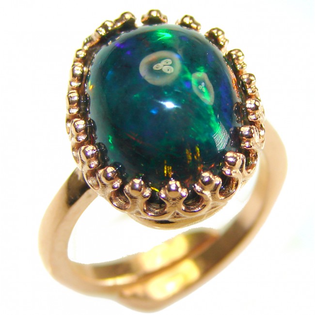 A COSMIC POWER Genuine 24.2 carat Black Opal 18K Gold over .925 Sterling Silver handmade Ring size 8 adjustable