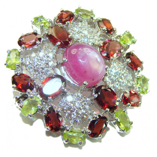 Excellent quality 5.2 carat Genuine Star Ruby .925 Sterling Silver handmade Pendant - Brooch - Close-up of multicolored gemstone brooch with central star ruby.