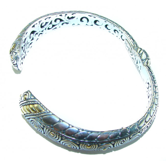 Bali Legacy 28.9 grams authentic 2 tones .925 Sterling Silver handcrafted bracelet - Side view of ornate Bali Legacy two-tone sterling silver bracelet.