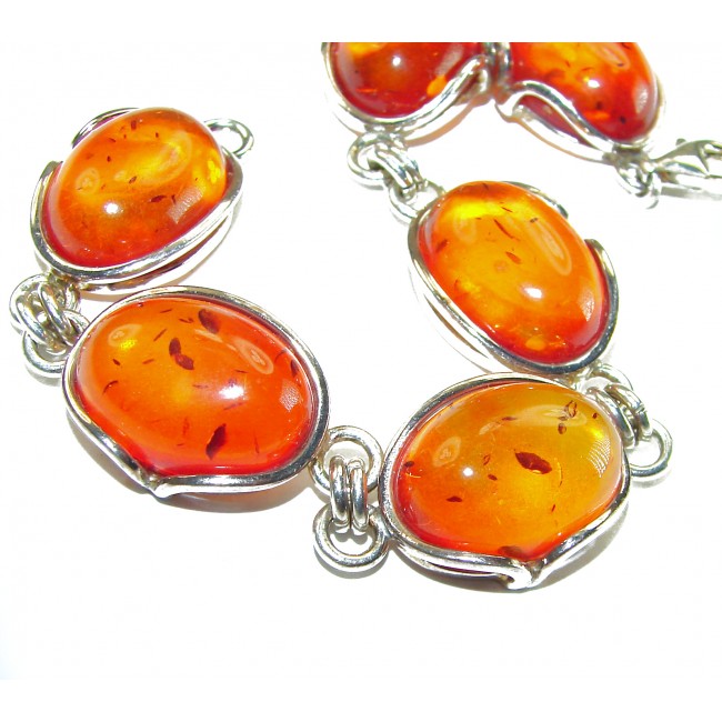 Excellent quality Baltic Amber .925 Sterling Silver entirely handcrafted Bracelet - Close-up of Baltic Amber stones in silver setting.