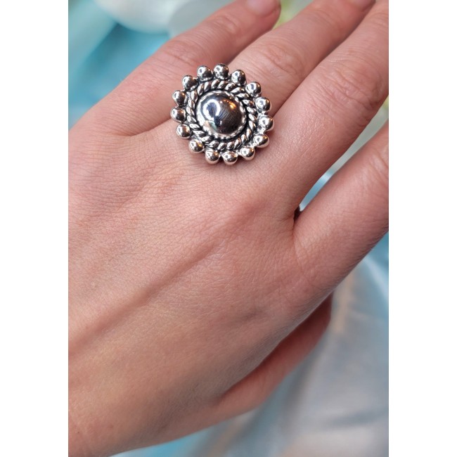 Precious Flower Bali made .925 Sterling Silver handcrafted Ring s. 8 - Sterling silver ring worn on hand, detailed flower design, top view.
