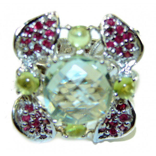 Authentic 5.8 carat Green Amethyst .925 Sterling Silver handmade Ring s. 7 1/2 - Close-up of green amethyst ring with red stones and sterling silver.