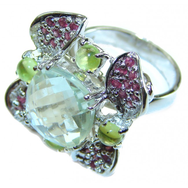 Authentic 5.8 carat Green Amethyst .925 Sterling Silver handmade Ring s. 7 1/2 - Close-up of green amethyst ring with accents, silver band visible.