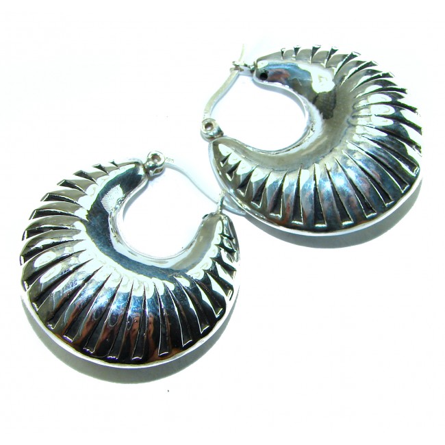 Highly Polished Fancy Modern design .925 Sterling Silver Italy made Earrings - Close-up of highly polished sterling silver earrings with modern design.