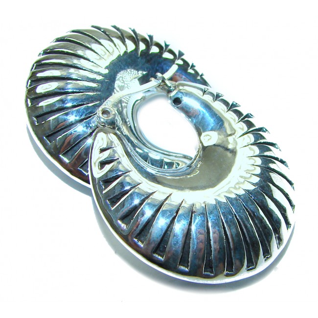 Highly Polished Fancy Modern design .925 Sterling Silver Italy made Earrings - Close-up of highly polished .925 Sterling Silver jewelry.