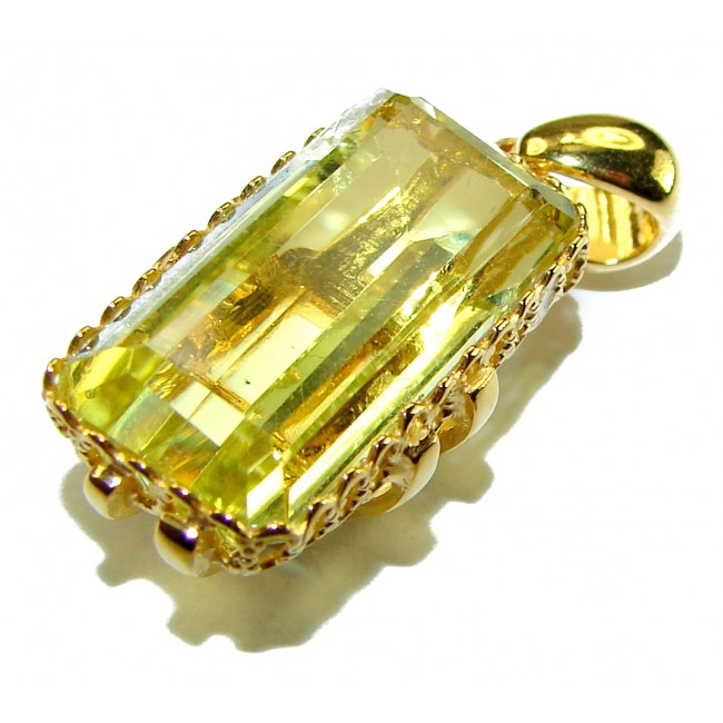 Emerald cut 15.3 carat Lemon Quartz 18K Gold over .925 Sterling Silver handcrafted pendant - Close-up of emerald cut Lemon Quartz pendant in gold setting.