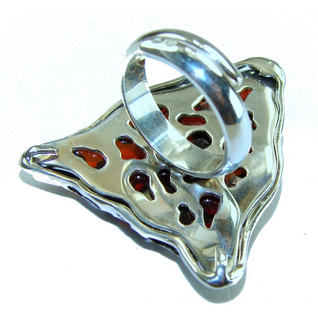 Precious Cheetah Baltic Amber .925 Sterling Silver handmade Large ring size 8 adjustable - Ring close-up with red amber and silver cheetah pattern design.