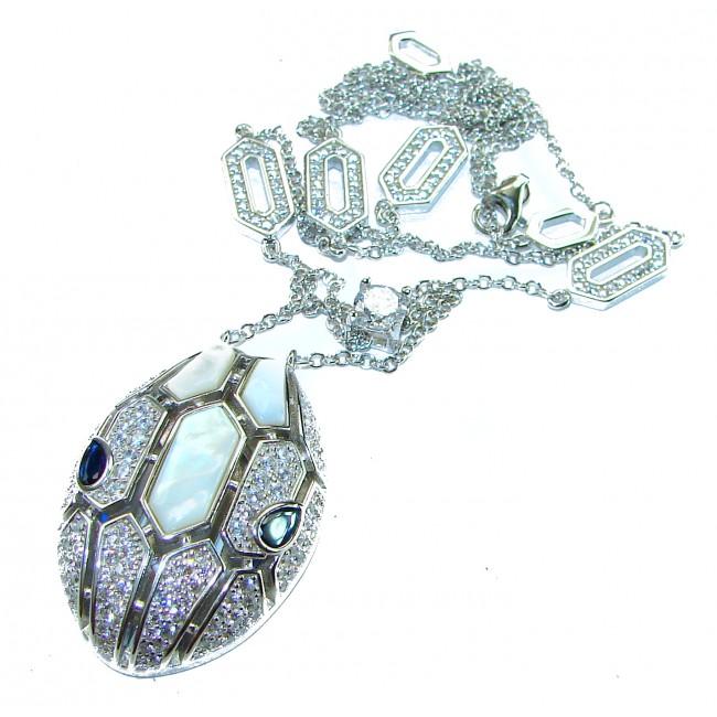 Great Masterpiece Snake's Head genuine 4.1 carat Sapphire Blister Pearl .925 Sterling Silver handmade necklace - Snake's Head pendant, side view, showcasing 4.1 carat Sapphire accents.