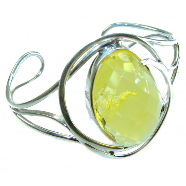 Vintage Design Genuine faceted Butterscotch Polish Amber .925 Sterling Silver handmade Bracelet / Cuff - Side view of vintage design bracelet with a faceted butterscotch amber.