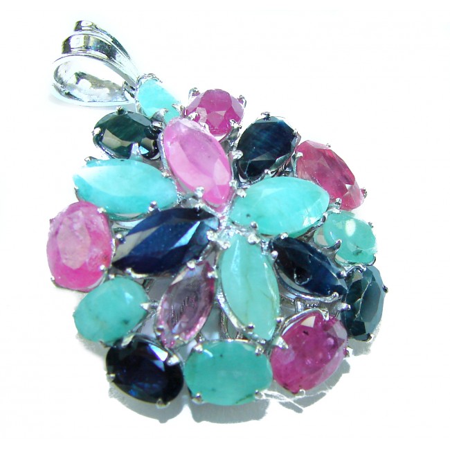Precious Genuine 21.5 carat Emerald Ruby Sapphire .925 Sterling Silver handmade Pendant - Close-up of a colorful gemstone pendant with emerald, ruby, and sapphire.