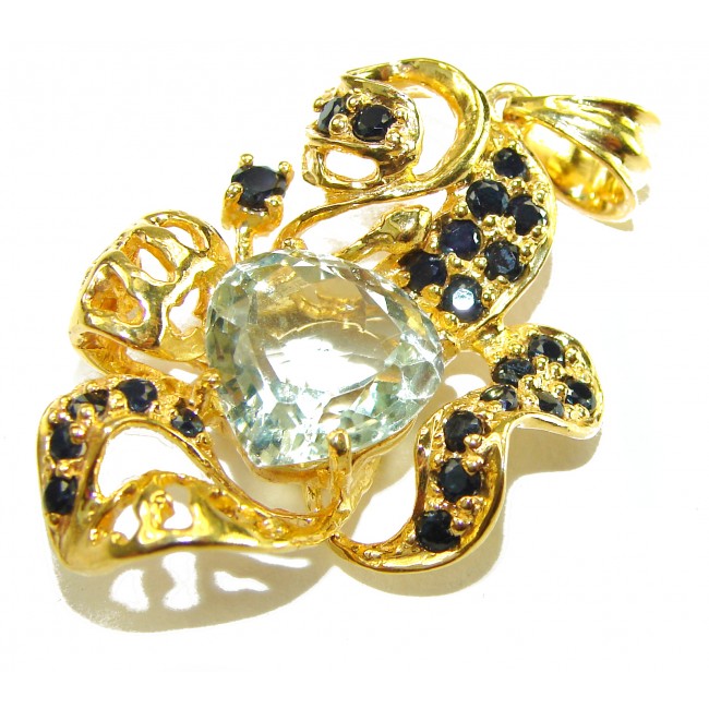 11.8 carat Green Amethyst - Prasolite 14K Gold over .925 Sterling Silver handcrafted pendant - Gold pendant with prasiolite and blue stones, angled top view.
