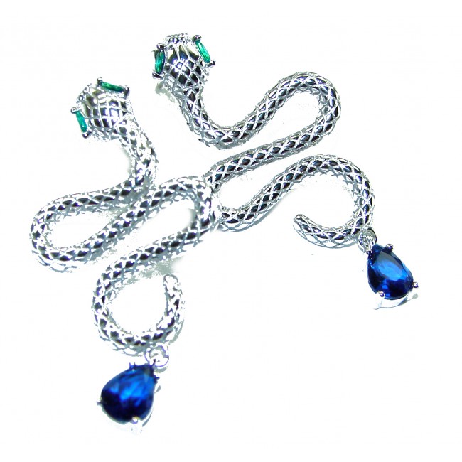 Golden Cobra Snakes 1.5 carat Sapphire .925 Sterling Silver earrings - Silver snake earrings with sapphires and emeralds, top view.