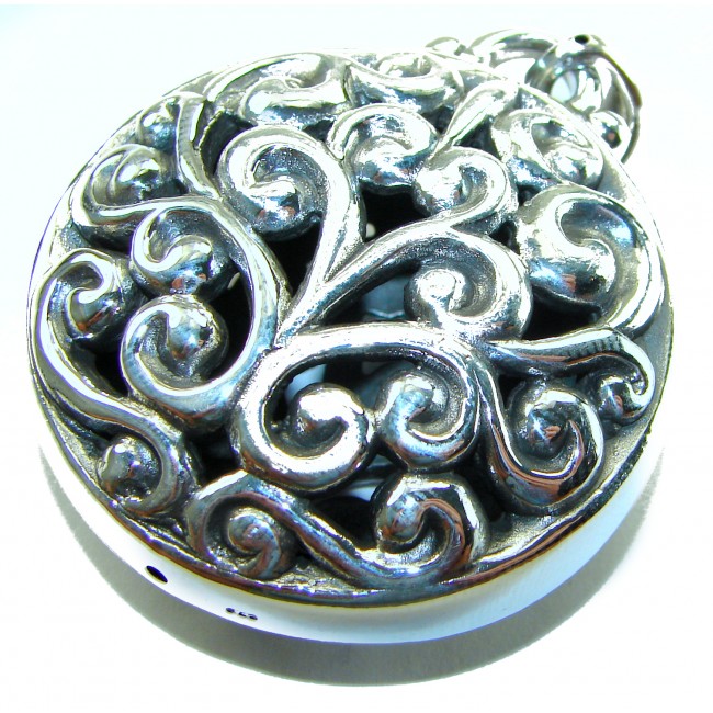 Bali Spirit Large Sterling Beauty .925 Silver Bali handmade Pendant - Close-up of ornate sterling silver Bali Spirit pendant detail.
