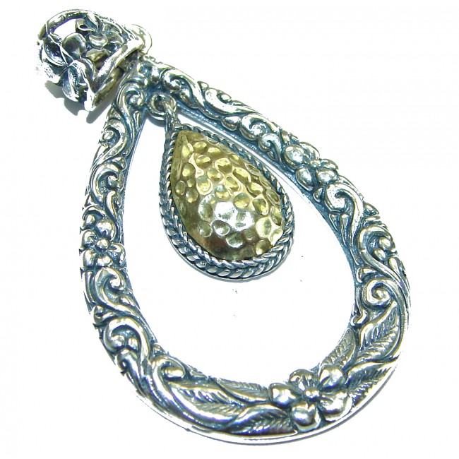 Bali Treasure 2 tones .925 Sterling Silver BALI handcrafted Pendant - Ornate silver pendant with gold-tone texture, top view.