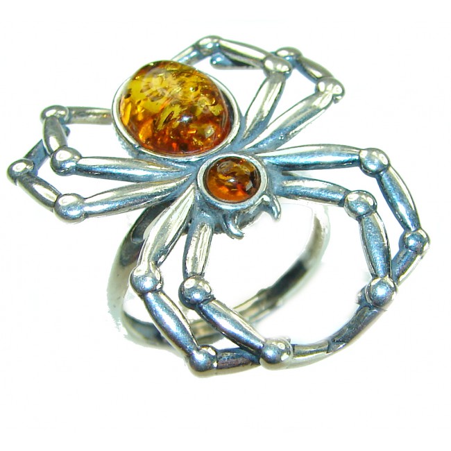 Golden Spider Authentic Baltic Amber .925 Sterling Silver handcrafted ring; s. 7 adjustable - Spider-shaped ring with amber stones, top view.