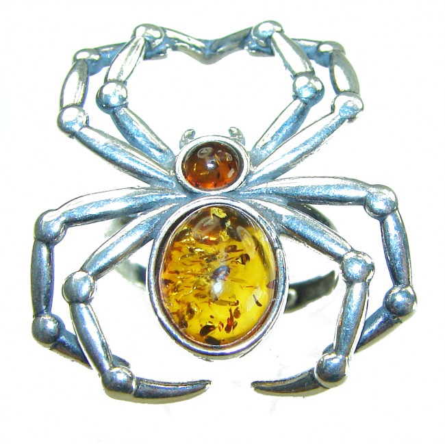Golden Spider Authentic Baltic Amber .925 Sterling Silver handcrafted ring; s. 7 adjustable - Spider-shaped silver ring with amber stones, top view.