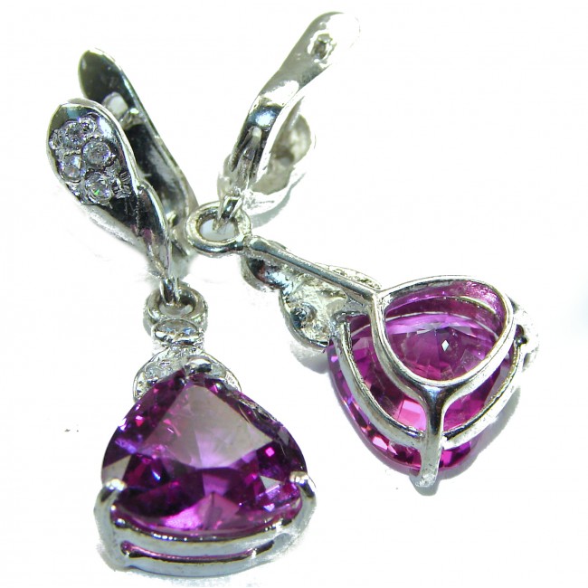 The Spade - Deep Purple Heart 11.8 carat Authentic Topaz .925 Sterling Silver Handcrafted earrings - Close-up of purple topaz earrings with silver clasps.
