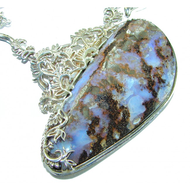 Back to nature Australian Boulder Opal .925 Sterling Silver brilliantly handcrafted necklace - Close-up of Australian Boulder Opal pendant with intricate silver detailing.