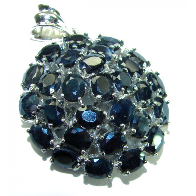 Penelope Authentic 23.5 carat faceted Sapphire .925 Sterling Silver handcrafted Statement Pendant - Close-up of Sapphire .925 Sterling pendant with multiple faceted stones