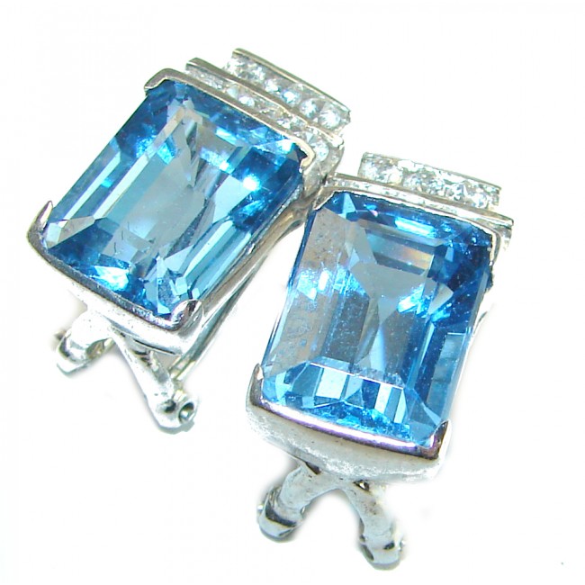 Purity 12.5 carat Swiss Blue Topaz .925 Sterling Silver handmade Statement earrings - Close-up of Swiss Blue Topaz earrings in Sterling Silver settings.