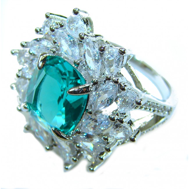 Luxurious 6.5 ctw Colombian Emerald .925 Sterling Silver handcrafted Statement Ring size 7 1/2 - Close-up of luxurious emerald and sterling silver ring with clear stones.