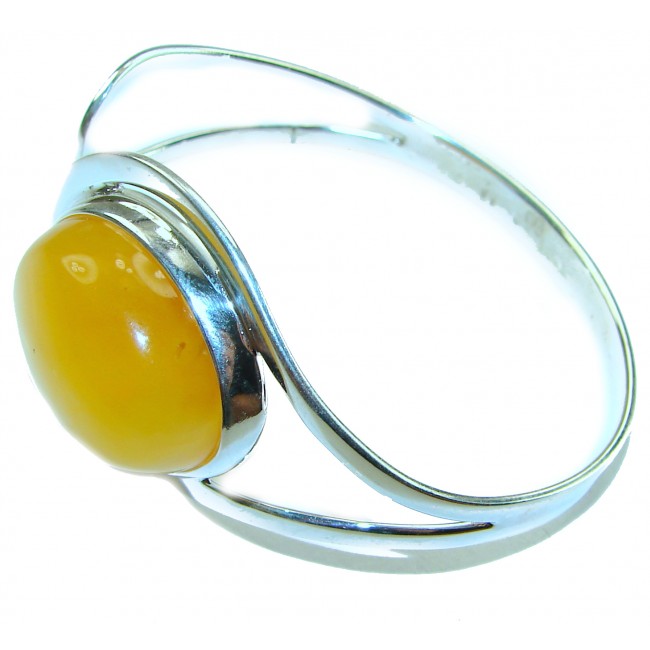 Vintage Design 21.8 grams Genuine Butterscotch Polish Amber .925 Sterling Silver handmade Bracelet / Cuff - Side view of vintage butterscotch amber bracelet in silver setting