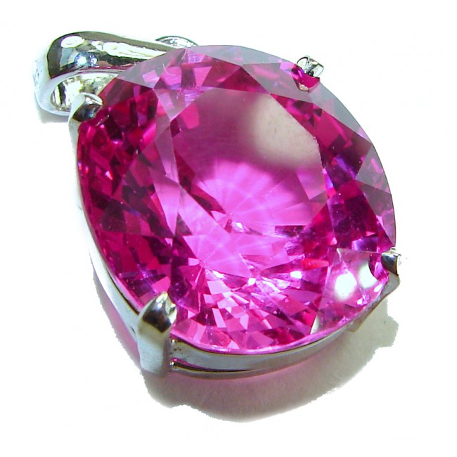 Pink Beauty - Oval cut 14.4 carat Pink Sapphire .925 Sterling Silver handcrafted pendant - Close-up of 14.4 carat oval pink sapphire in sterling silver setting.