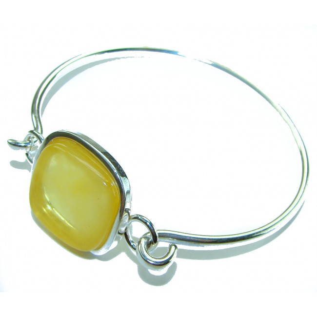 Genuine Butterscotch Polish Amber .925 Sterling Silver handmade Bracelet / Cuff - Sterling silver bracelet with butterscotch amber, angled view.