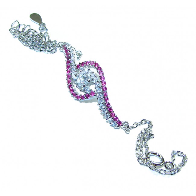 7.5 carat Ruby .925 Sterling Silver handmade Statement Bracelet - Ruby and silver bracelet, angled view, showcasing clasp and chain details.