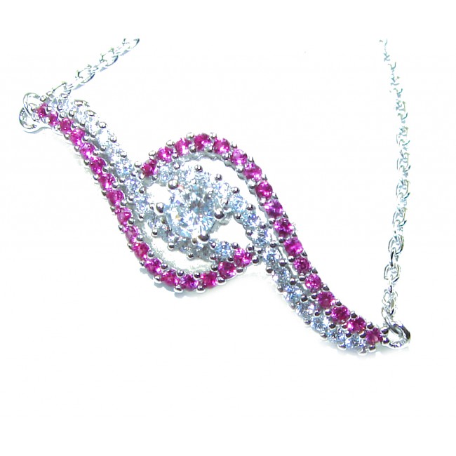 7.5 carat Ruby .925 Sterling Silver handmade Statement Bracelet - Ruby and silver bracelet, side view, showcasing stones and design details.
