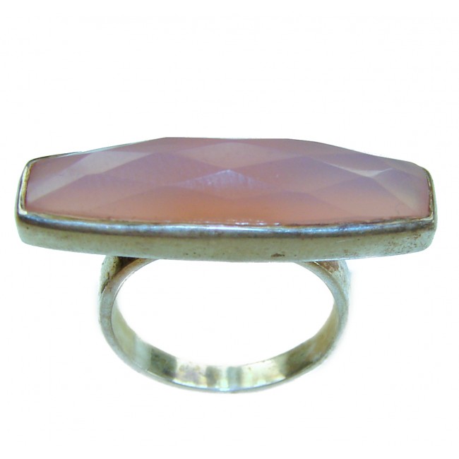 Extravaganza Authentic 8.5 carat Brazilian Rose Quartz .925 Sterling Silver incredible Ring size 6 - Side view of an 8.5 carat Brazilian Rose Quartz ring with silver band.