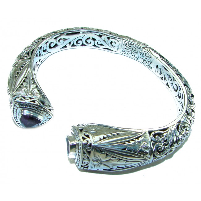 Infinity 49.5 grams authentic 8.9 carat Amethyst Floral Bracelet in .925 Sterling Silver handcrafted bracelet - Ornate silver bracelet with amethyst, detailed floral engraving, top view.