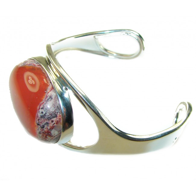 Simplicity 85.5 carat Genuine Mexican Fire Opal handcrafted .925 Sterling Silver Bracelet / Cuff - Side view of silver bracelet with large Mexican Fire Opal stone.