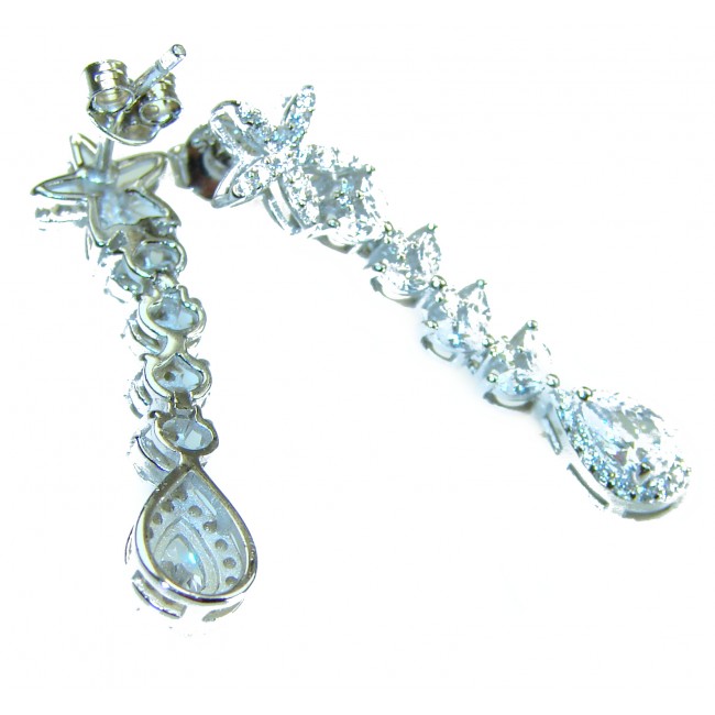 Precious genuine 7.9 carat White Sapphire .925 Sterling Silver handcrafted earrings - Dangling earrings with white sapphires in silver, side view.