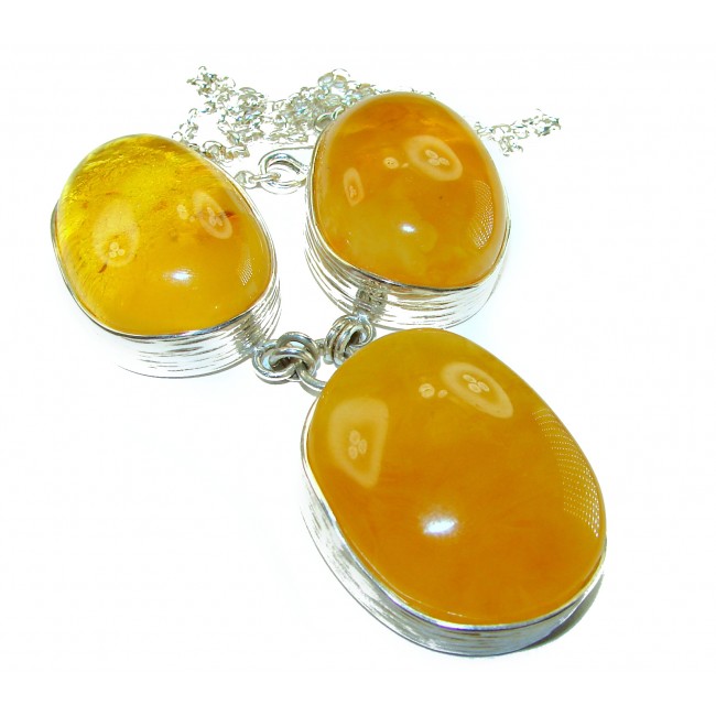 Dazzling 128.2 carat natural Baltic Amber .925 Sterling Silver handcrafted necklace - Close-up of natural Baltic Amber stones set in .925 sterling silver.
