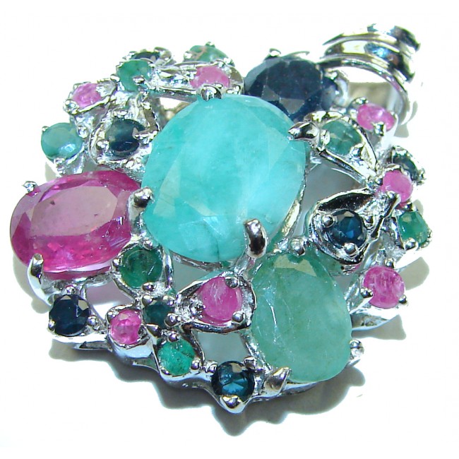 Spectacular 12.8 carat authentic Colombian Emerald .925 Sterling Silver handcrafted Pendant - Close-up of colorful gemstone cluster featuring Colombian emeralds.